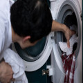 Waarom piept mijn wasmachine tijdens het wassen en hoe los ik het op?