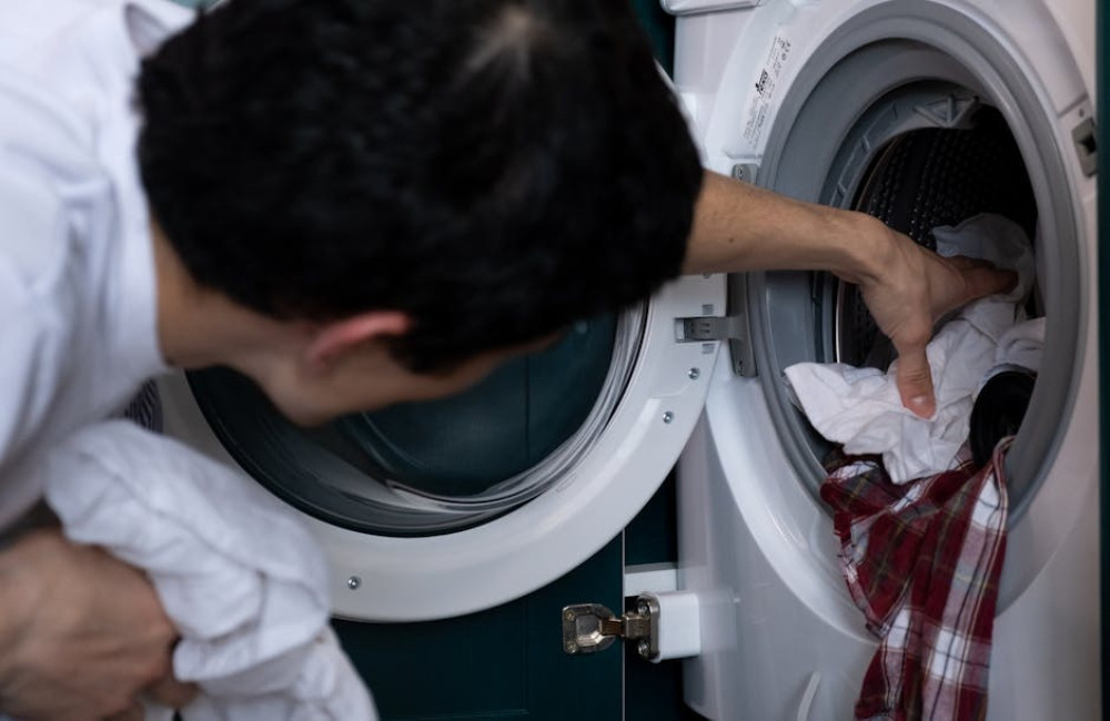 Waarom piept mijn wasmachine tijdens het wassen en hoe los ik het op?